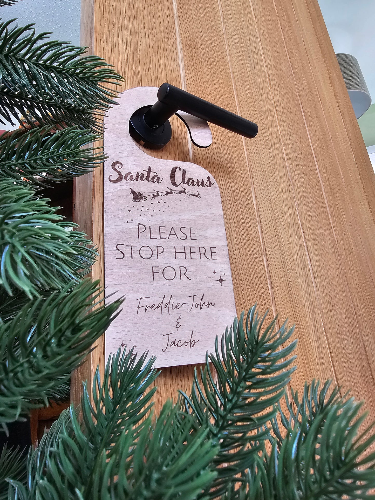 'Santa stop here' door hanger