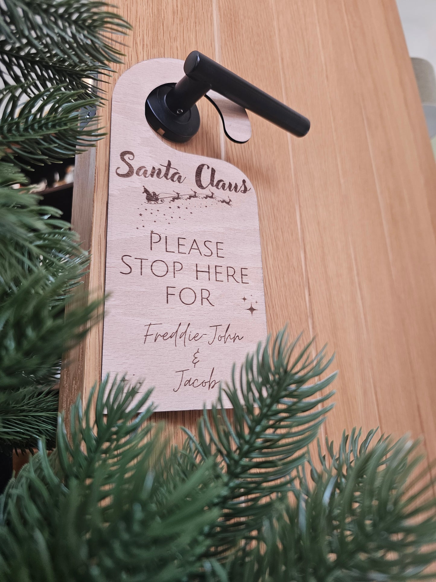 'Santa stop here' door hanger